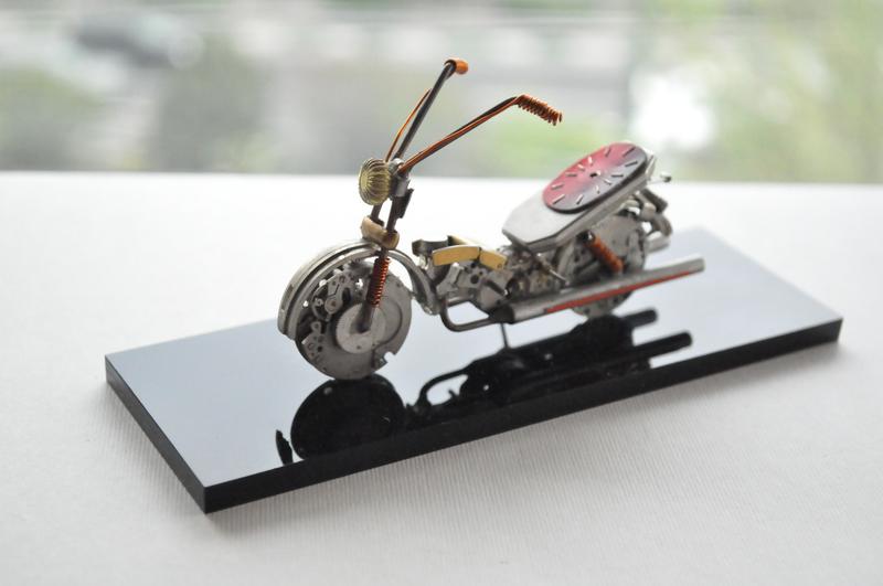 Motorbike sculpture made from watch parts